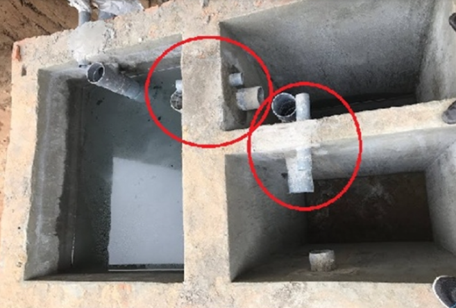Cách đặt ống xả thải vào trong hầm cầu